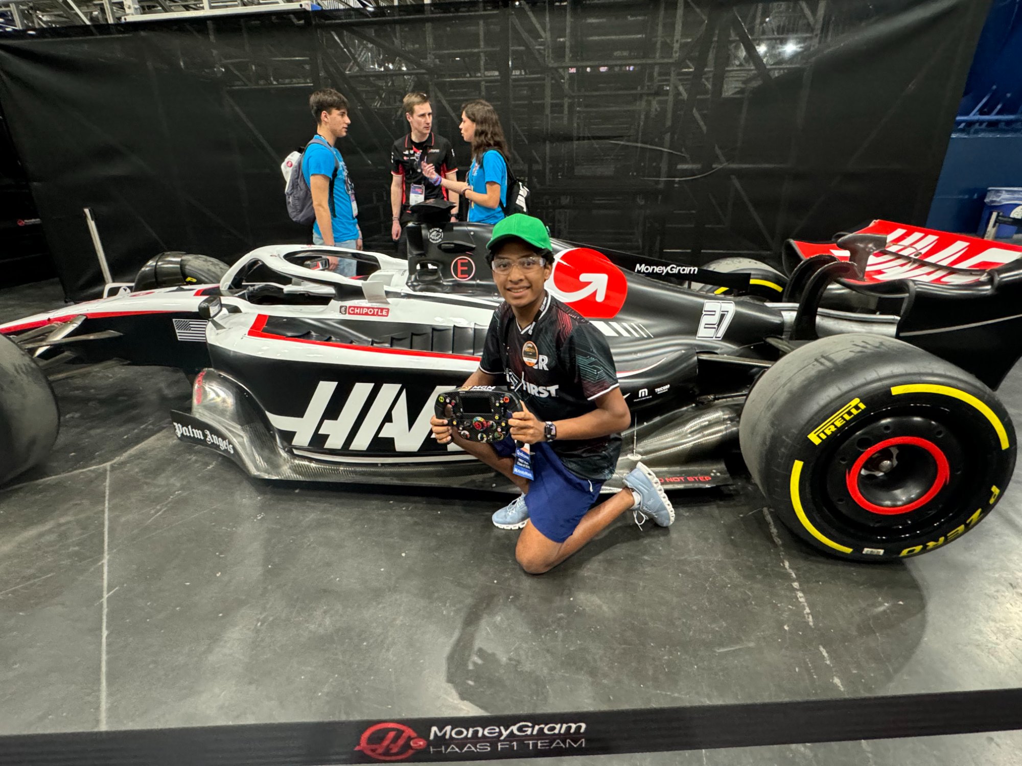 Zayne with the MoneyGram Haas F1 Team car
